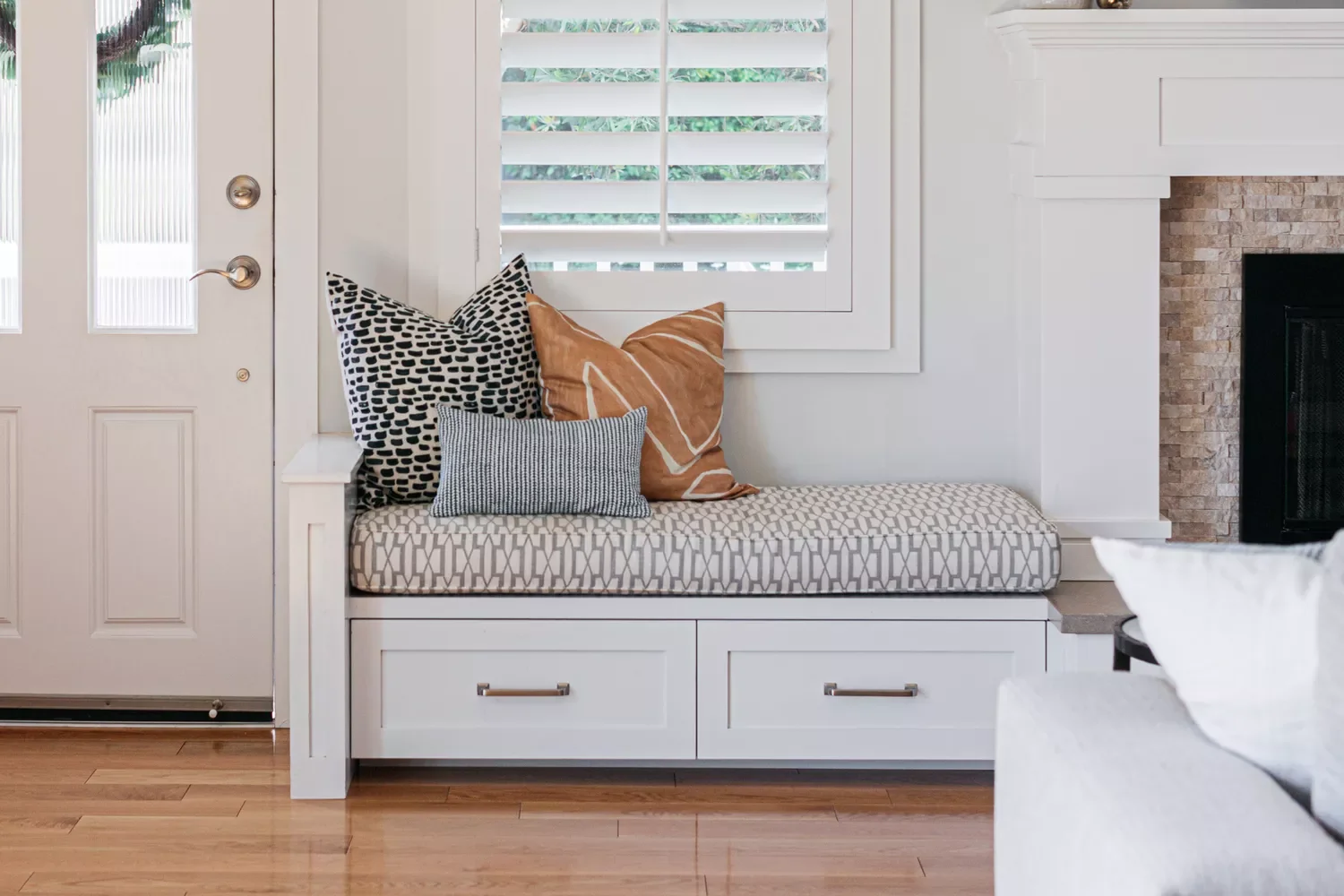 20 Brilliant Living Room Storage Solutions That Keep Your Space Beautiful Add a Window Seat