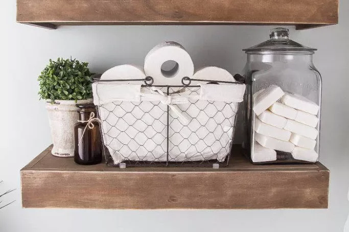 35 Brilliant Bathroom Organization Ideas That Will Transform Your Space Instantly Add an Above-Toilet Shelving Unit