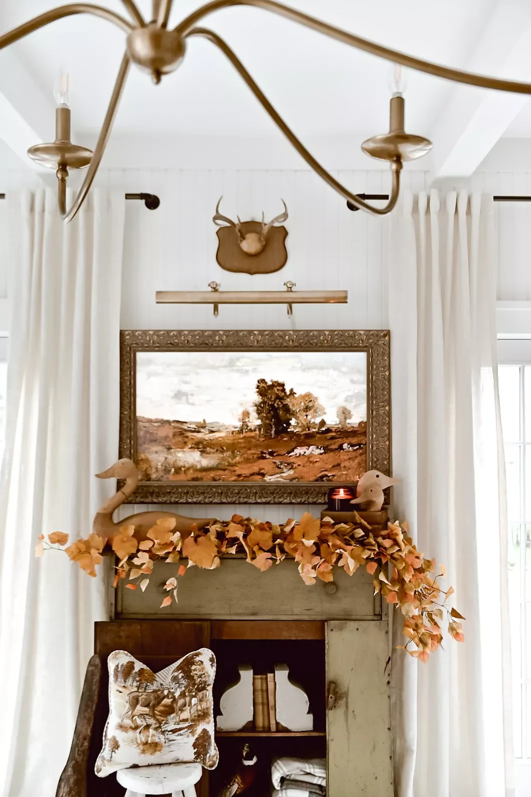 21 Brilliant Ways to Style Your Small Living Room TV Without Compromising Style 13 Add an Ornate Frame