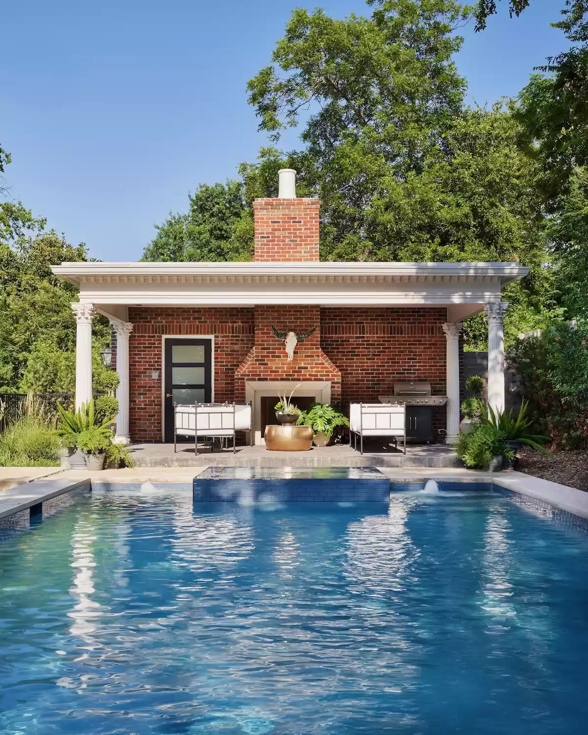 38 Stunning Pool House Ideas to Create Your Dream Backyard Retreat 15 Add an Outdoor Fireplace