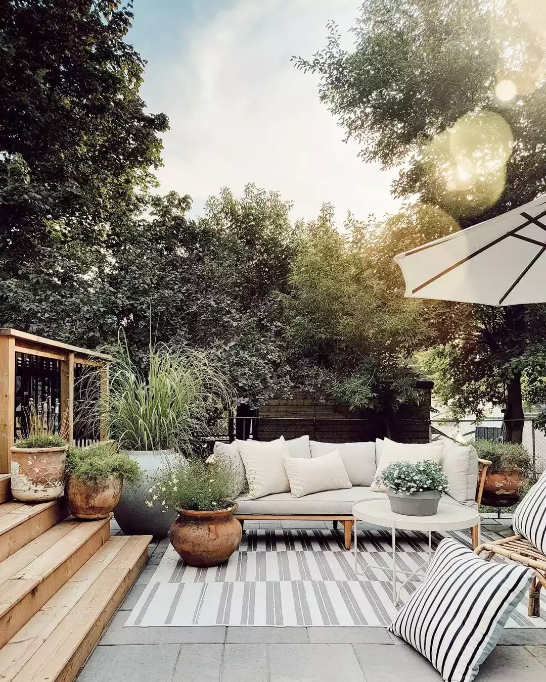 25 Outdoor Seating Ideas That'll Make You Want to Live Outside 12 Add an Outdoor Rug