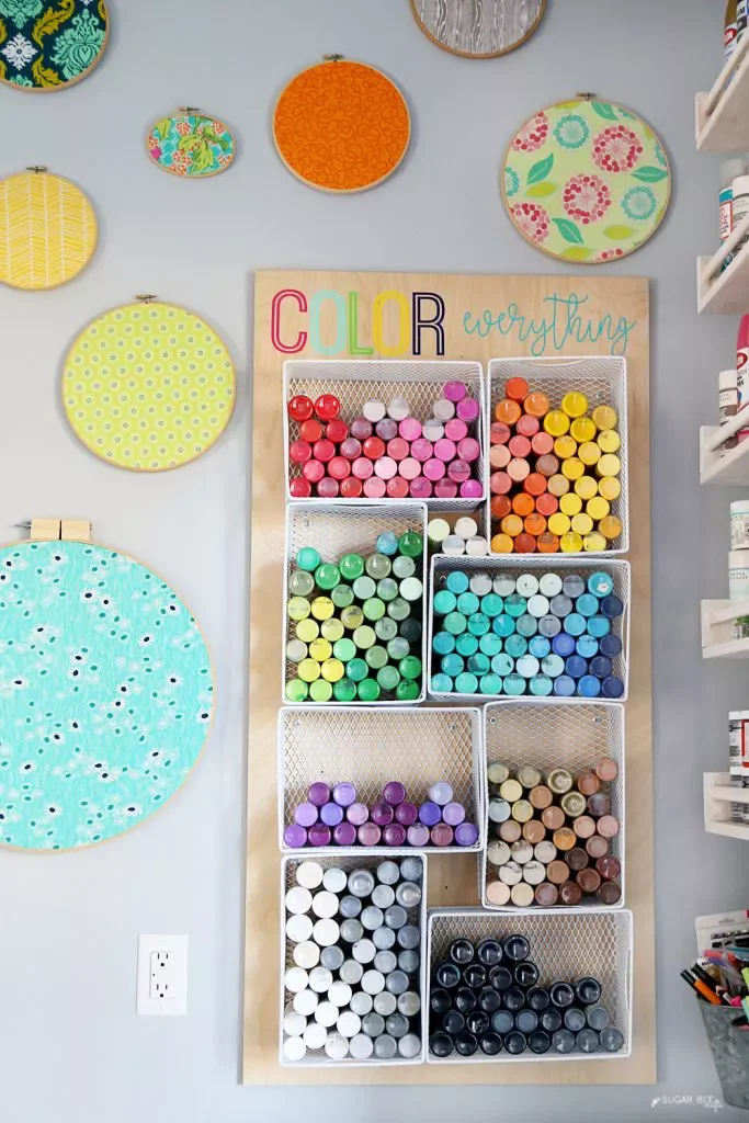 15 Brilliant Ways to Organize Your Craft Room Like a Pro Adhere Bins to the Wall for Storage
