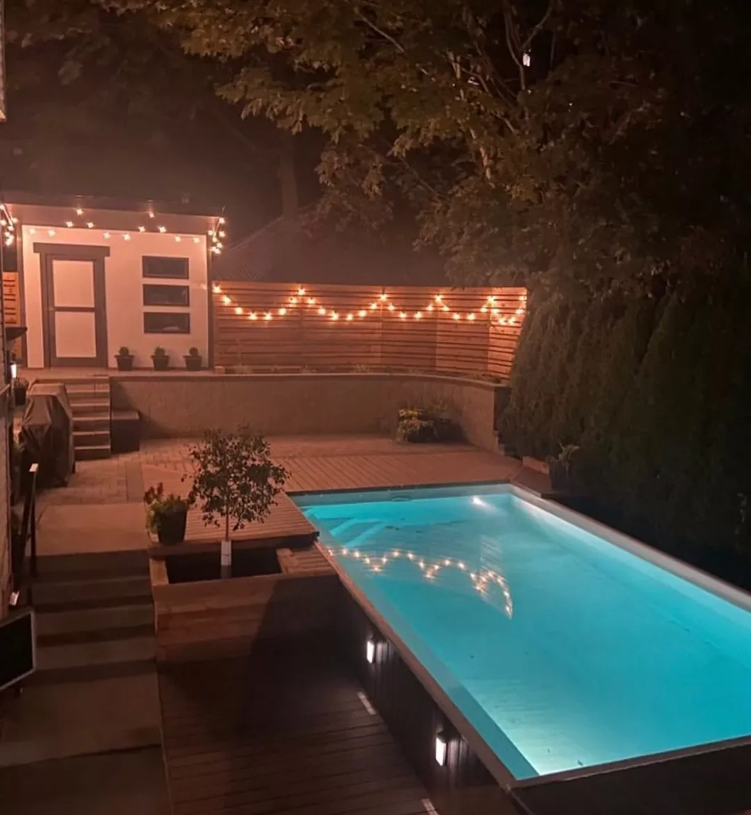 14 Stunning Pool Lighting Ideas That Will Transform Your Backyard Oasis 11 Adhere String Lights to the Fence