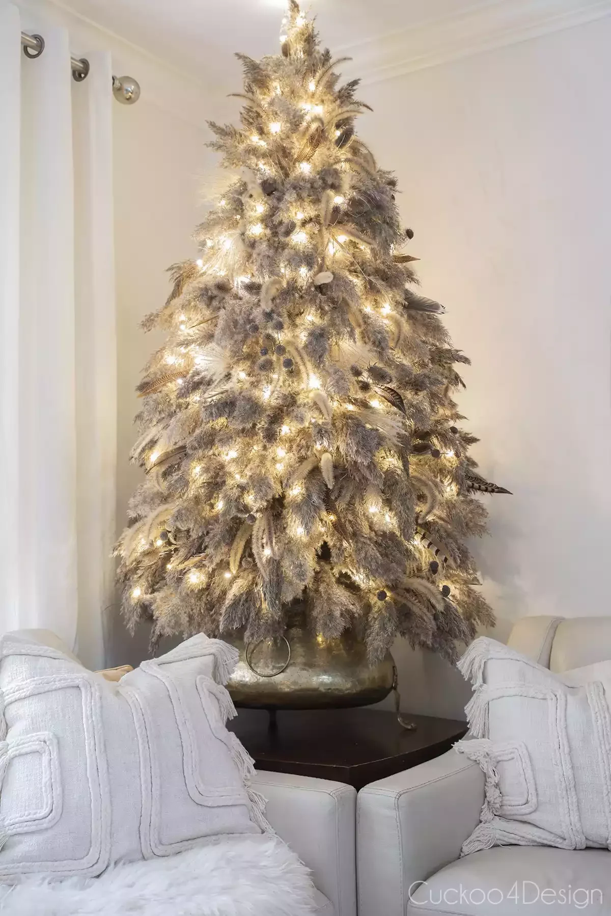19 Stunning Pampas Grass Christmas Tree Ideas for Your Boho Holiday Style 3 Adorn it With Feathers
