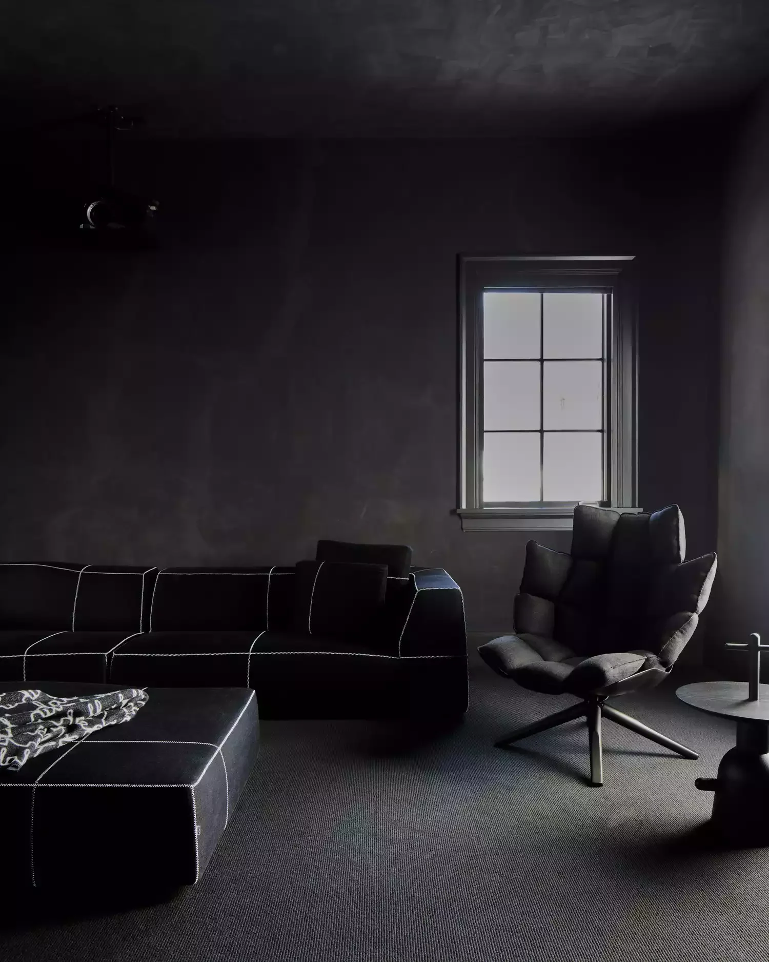 39 Bold Black Living Room Ideas That Will Transform Your Space Into Something Extraordinary 2 All-Black Living Room