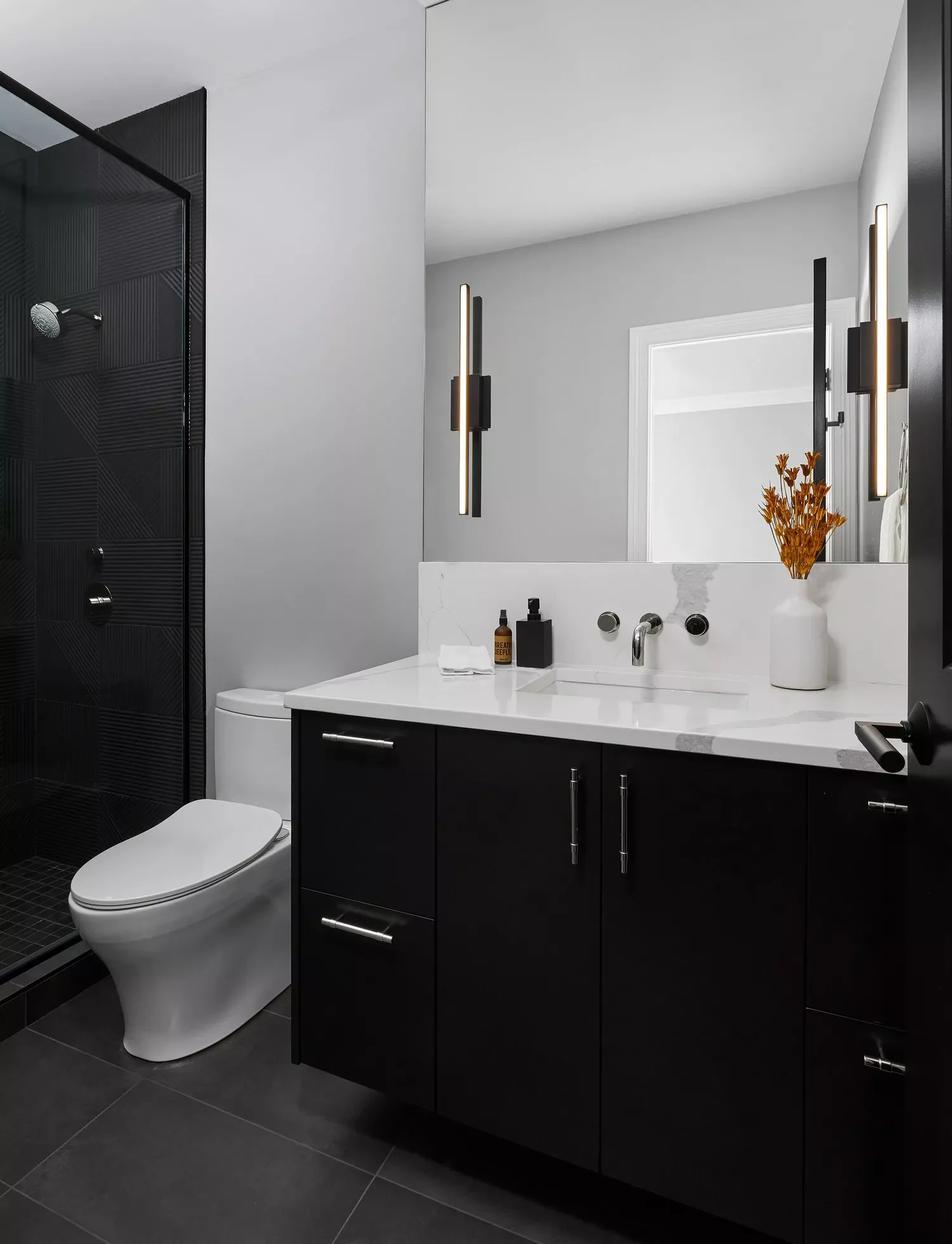 30 Stunning Walk-In Shower Tile Ideas to Transform Your Bathroom 9 All-Black Tile and Grout