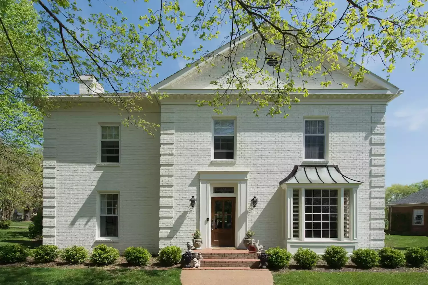 18 Stunning White Brick House Ideas to Transform Your Home's Exterior 14 All-White Brick and Trim