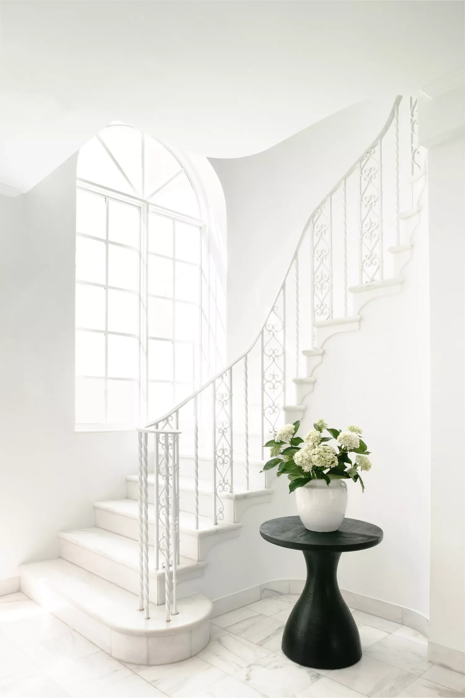 34 Stunning Stair Railing Designs That Transform Your Home 9 All-White Wrought Iron Railing