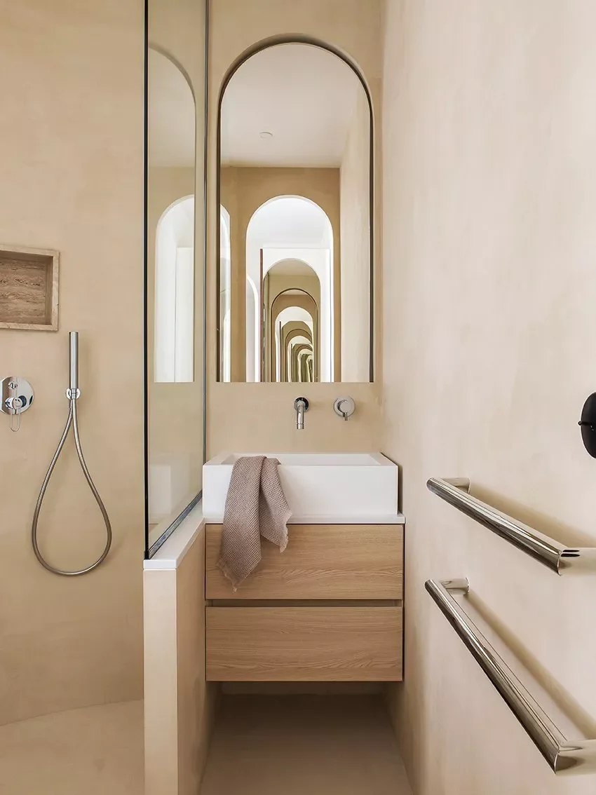 22 Clever Ways to Make Your Narrow Bathroom Feel Spacious and Stylish 17 Amplify Space With Mirrors
