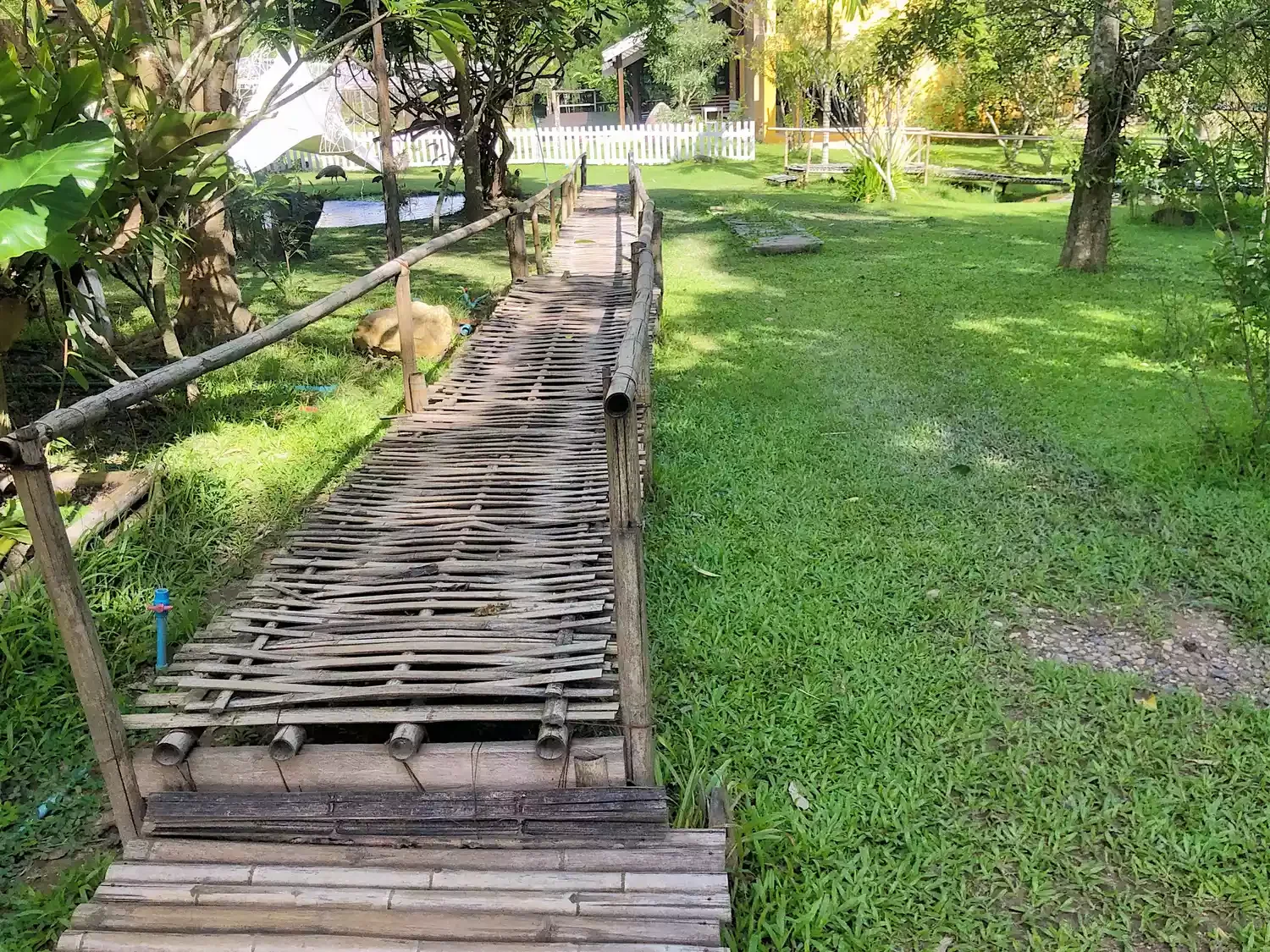 45 Beautiful Backyard Pathway Ideas to Transform Your Outdoor Space An Antique Bridge
