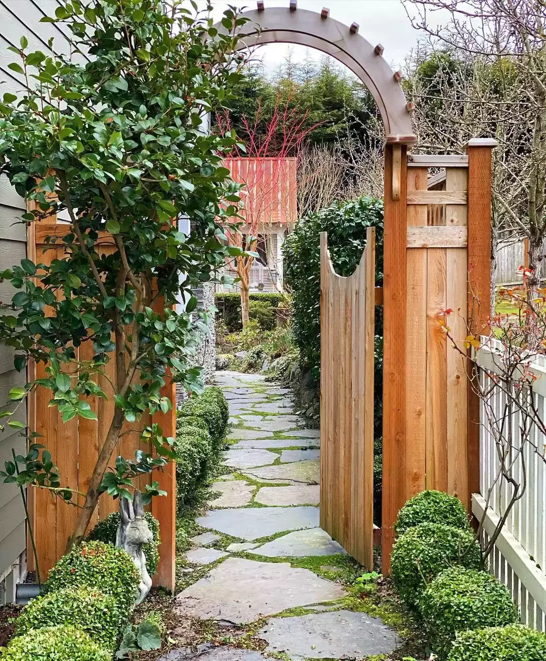 25 Creative Side Yard Transformations to Maximize Your Outdoor Space Arbor Over Gate