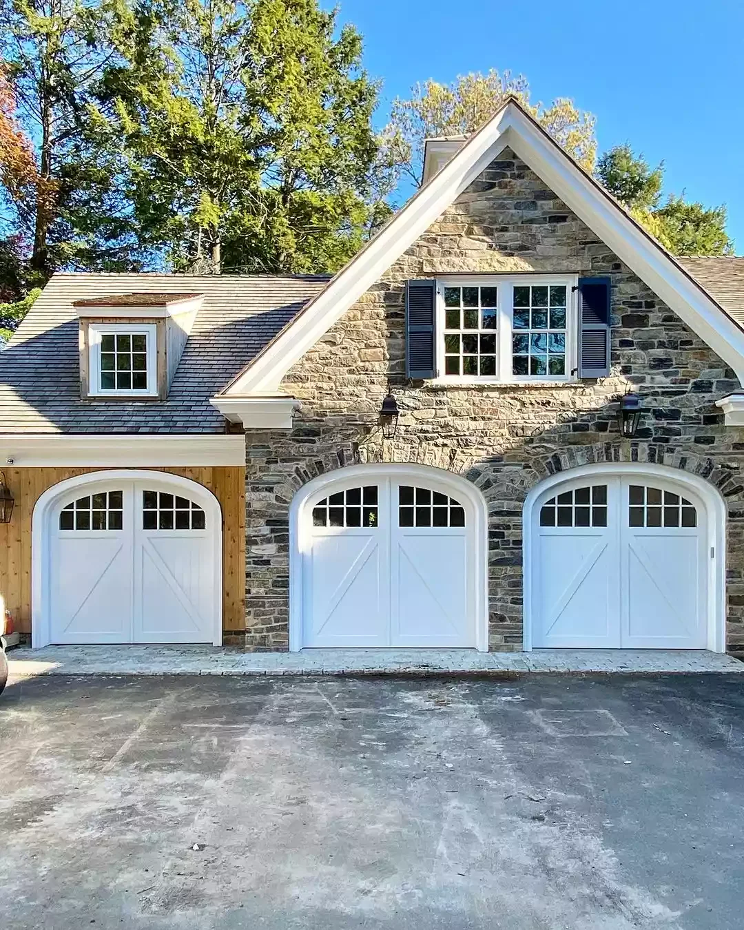 52 Stunning Garage Door Ideas That Will Transform Your Home's Curb Appeal Arched Doors With Decorative Trim
