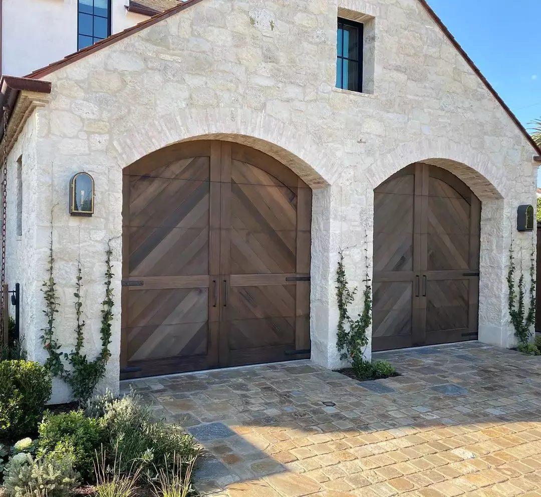 52 Stunning Garage Door Ideas That Will Transform Your Home's Curb Appeal Arched Wood Chevron Doors