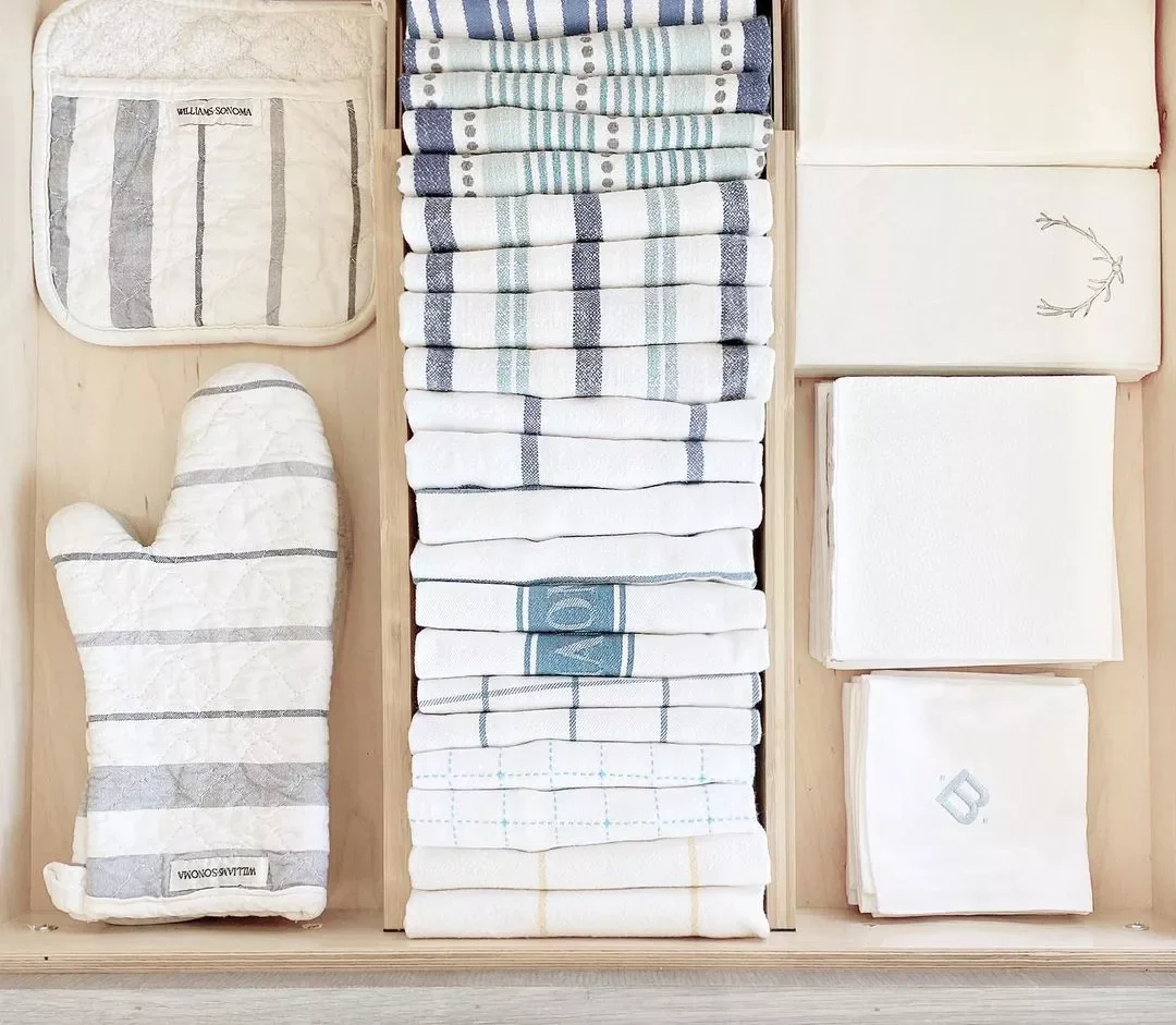 32 Clever and Stylish Ways to Store Your Towels Arrange Kitchen Towels Vertically