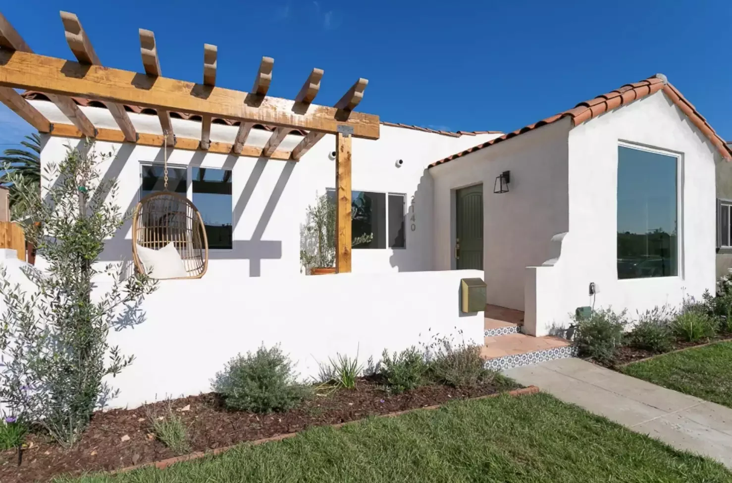 31 Stunning Pergola Ideas to Transform Your Backyard Into a Stylish Retreat 25 Attached Pergola