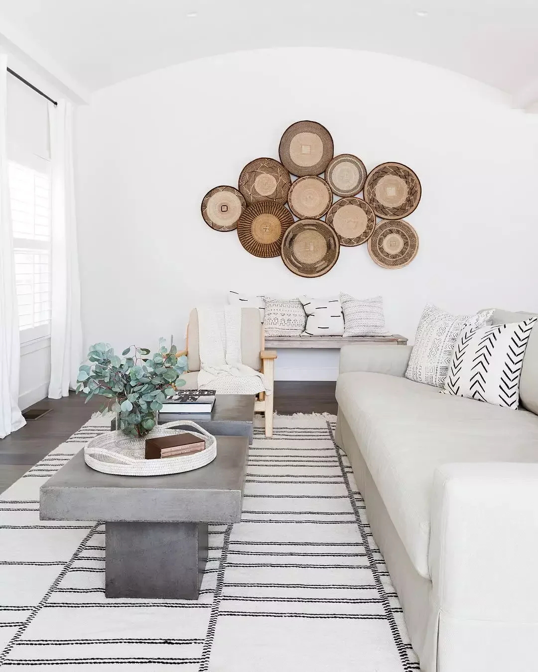 35 Creative Family Room Ideas for the Ultimate Hangout Space 17 Basket Gallery Wall
