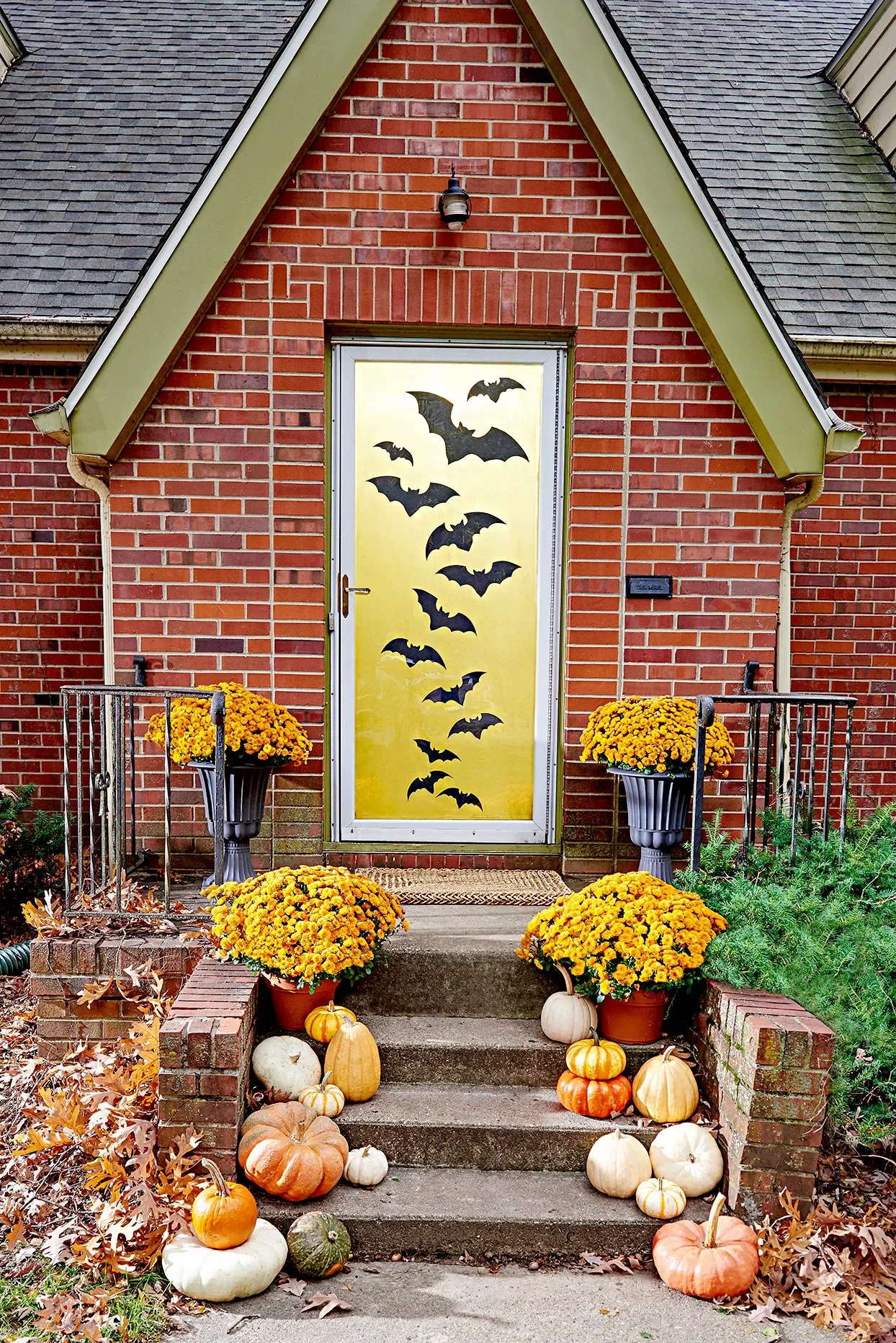 31 Spooky Halloween Front Porch Decorating Ideas for Fall 16 Bat Door Decorations