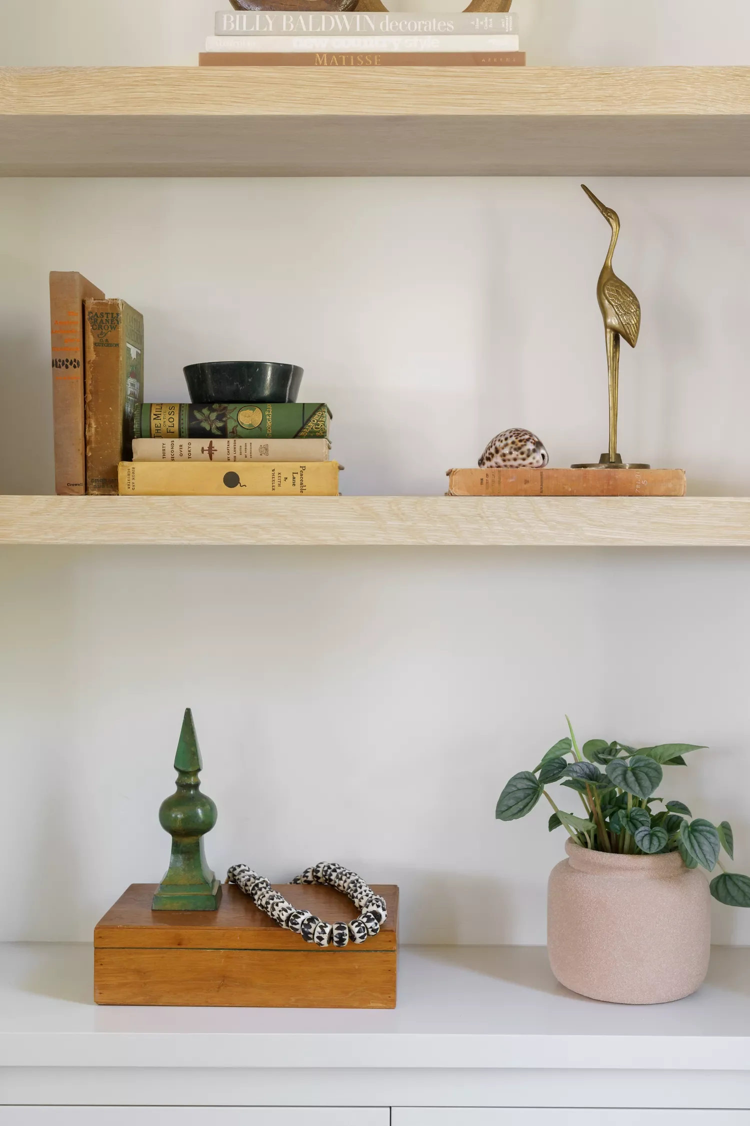 51 Creative Bookshelf Styling Ideas That Transform Your Space 24 Bejeweled Books