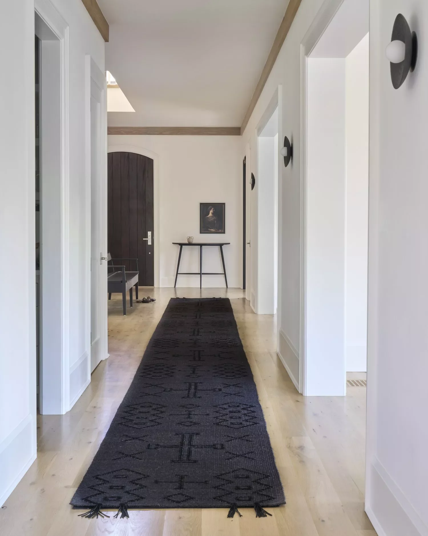 35 Stunning Black Door and White Trim Combinations That Create Perfect High-Contrast Drama 4 Black Arched Door