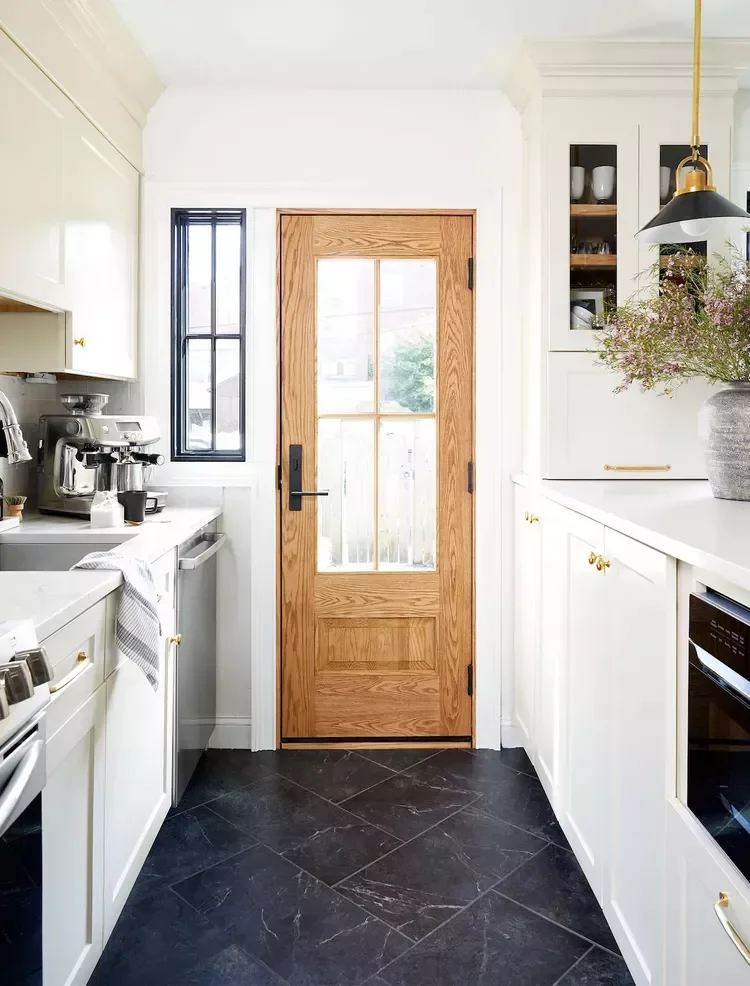 30 White Kitchen Cabinet Ideas That Will Always Be in Style Black Flooring