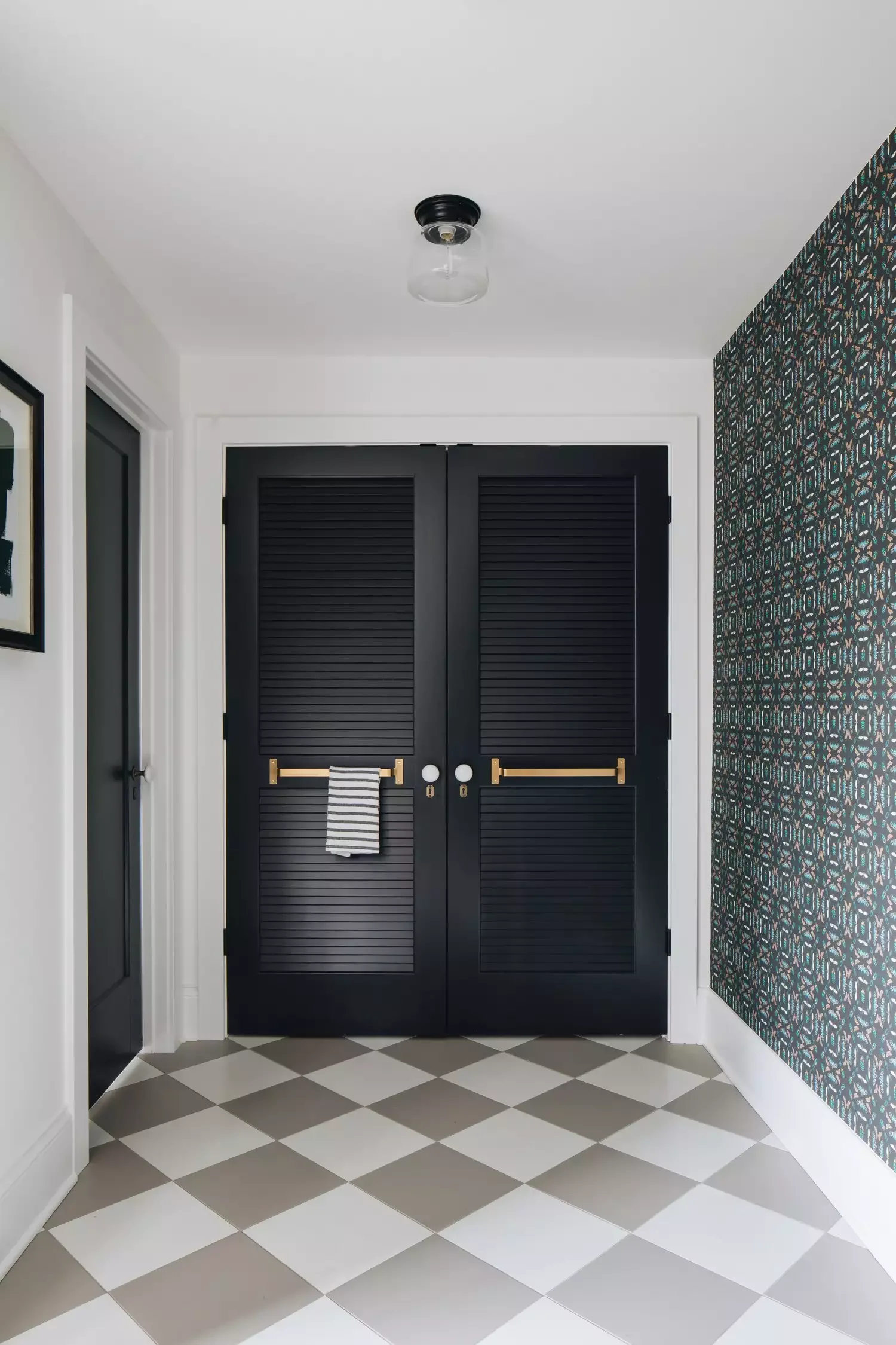 35 Stunning Black Door and White Trim Combinations That Create Perfect High-Contrast Drama 9 Black Laundry Closet Doors