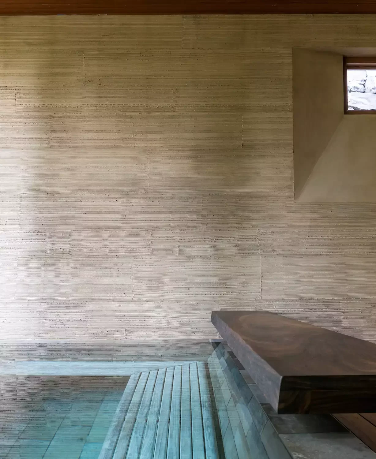 20 Stunning Pool Tile Ideas to Transform Your Swimming Area 8 Black Limestone