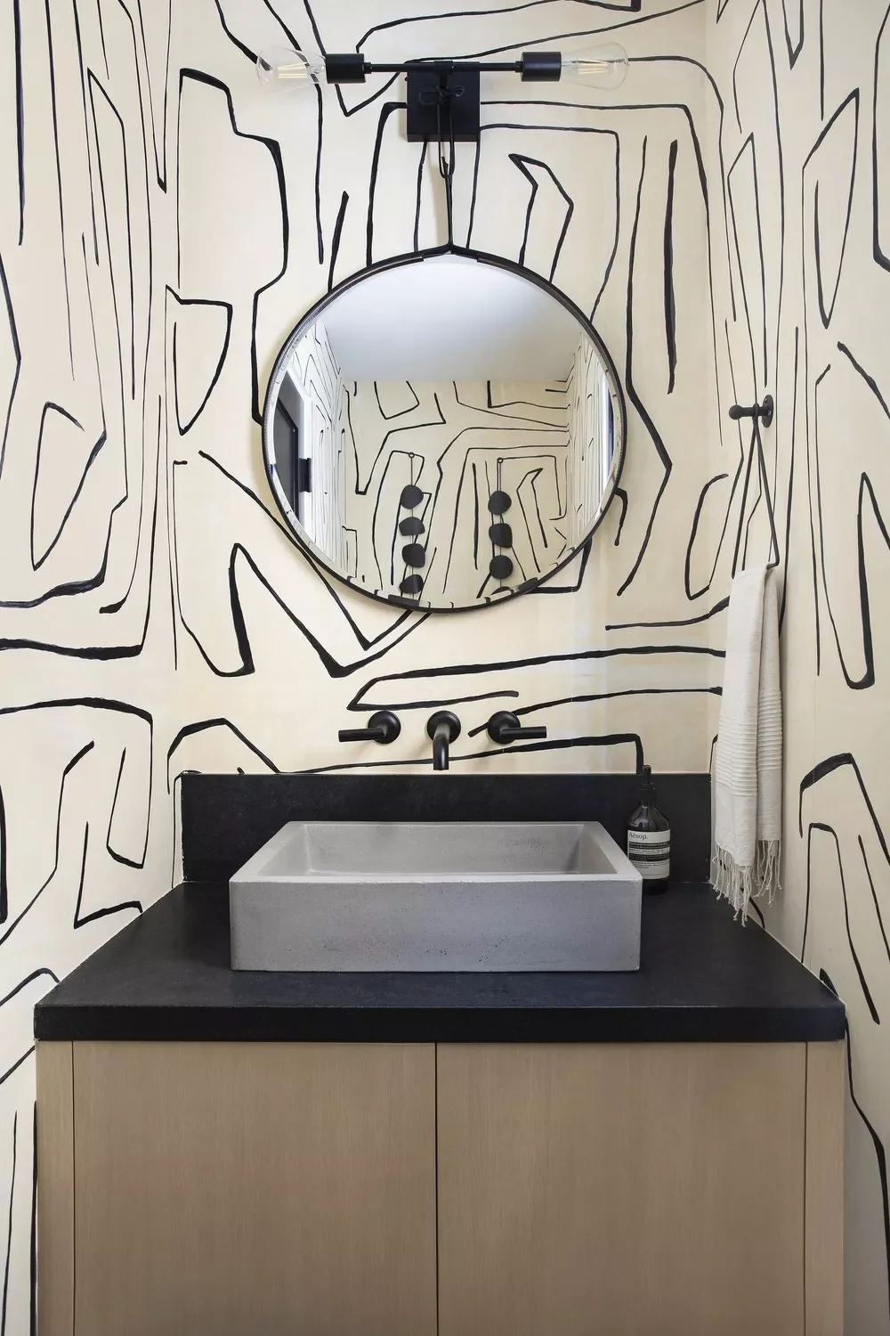 32 Powder Room Design Ideas That Turn Your Small Space Into a Style Statement Black-and-White Palette