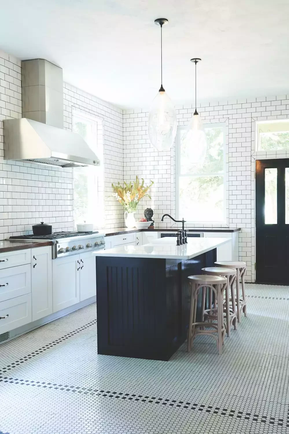 31 Stunning Kitchen Flooring Ideas That Combine Style with Practicality 19 Black-and-White Penny Tile