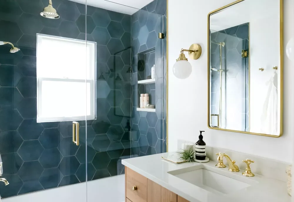 34 Stunning Blue Bathroom Ideas That Transform Your Space Into a Relaxing Retreat 26 Blue Hex Tile Shower