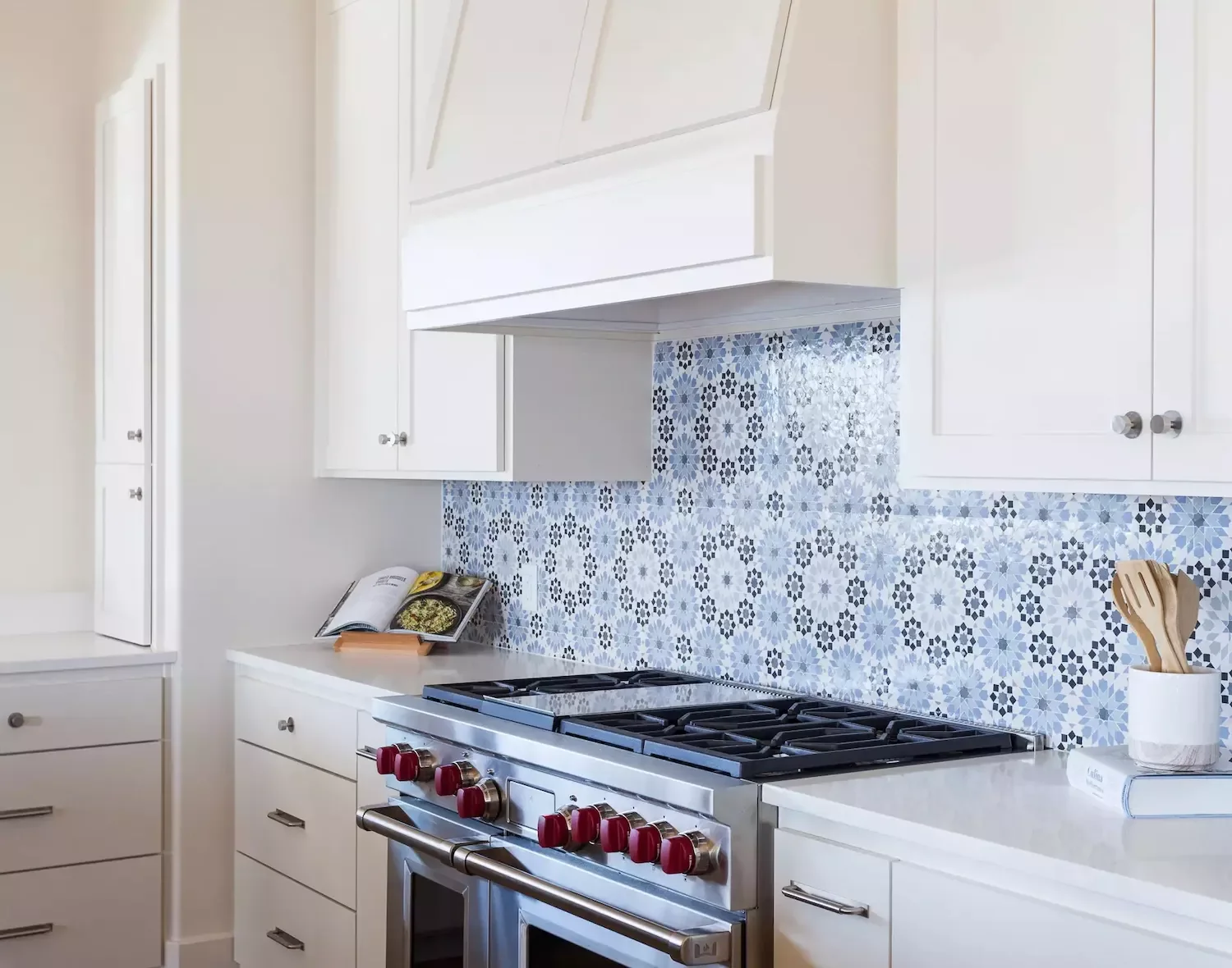 30 White Kitchen Cabinet Ideas That Will Always Be in Style Blue Patterned Tile Backsplash