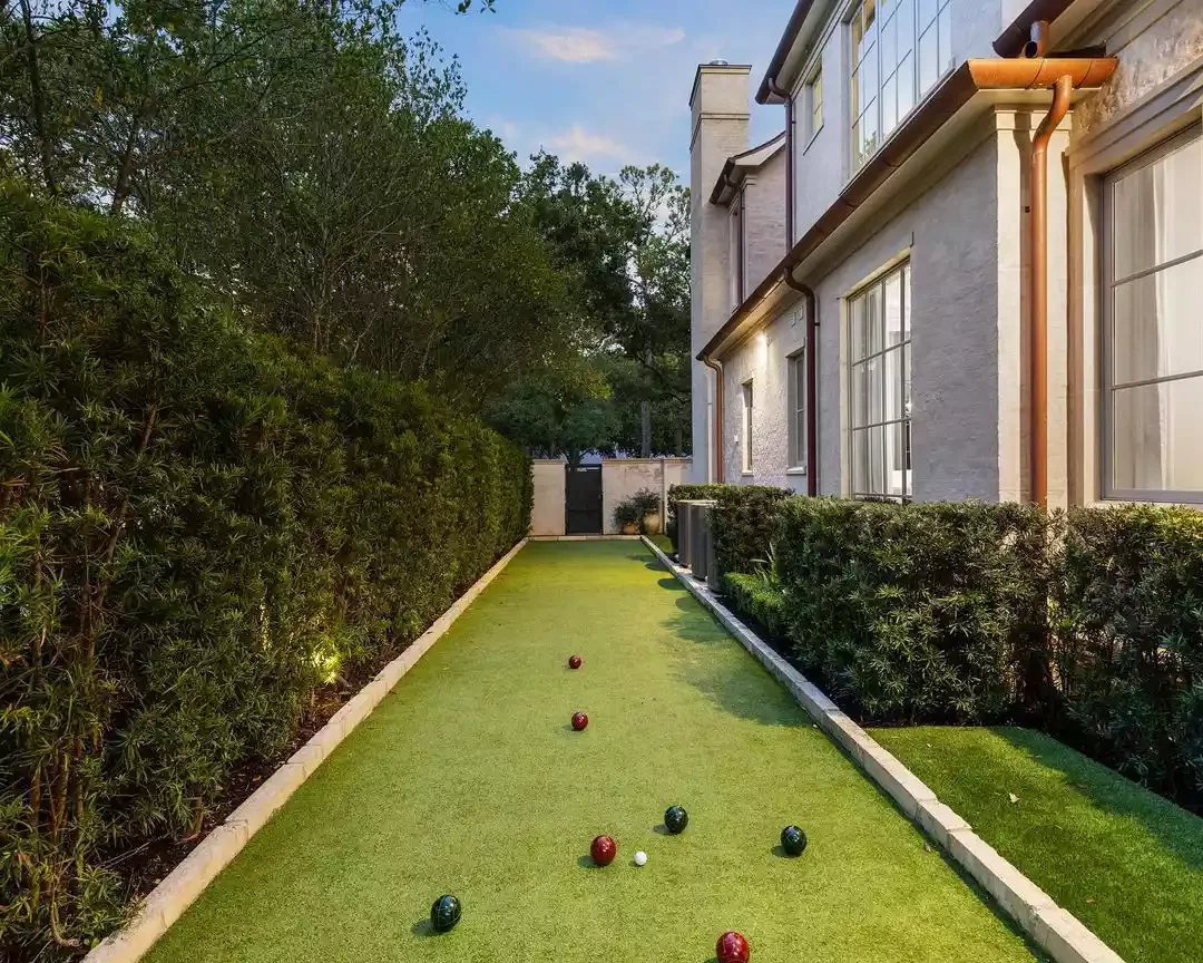 25 Creative Side Yard Transformations to Maximize Your Outdoor Space Bocce Ball Court
