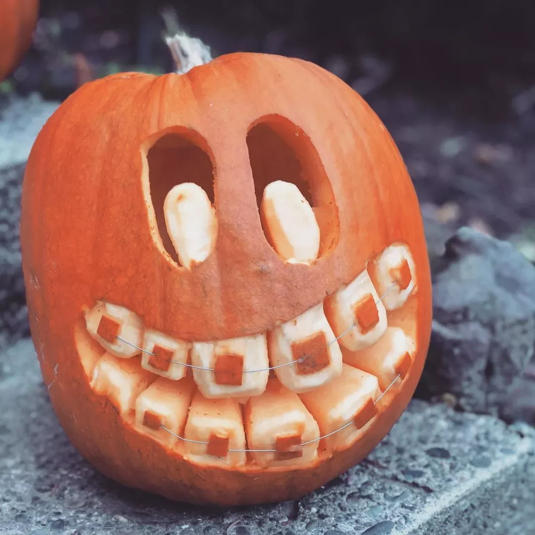 77 Creative Pumpkin Carving Ideas That'll Transform Your Fall Decorating Game 62 Braces Wearing Pumpkin