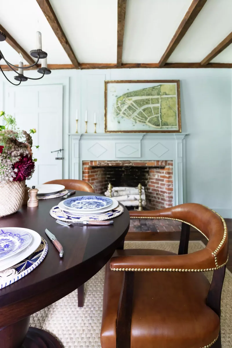 32 Living Room Mantle Decor Ideas That Add Style and Warmth 10 Brass Candlesticks and a Large Map