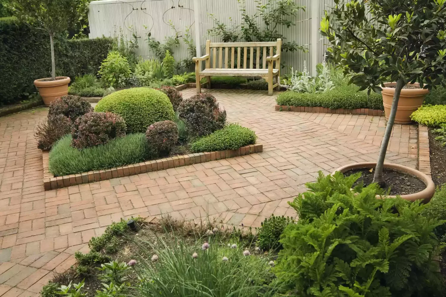 35 Stunning Brick Patio Ideas That Transform Outdoor Spaces Brick Patio With Planting Beds
