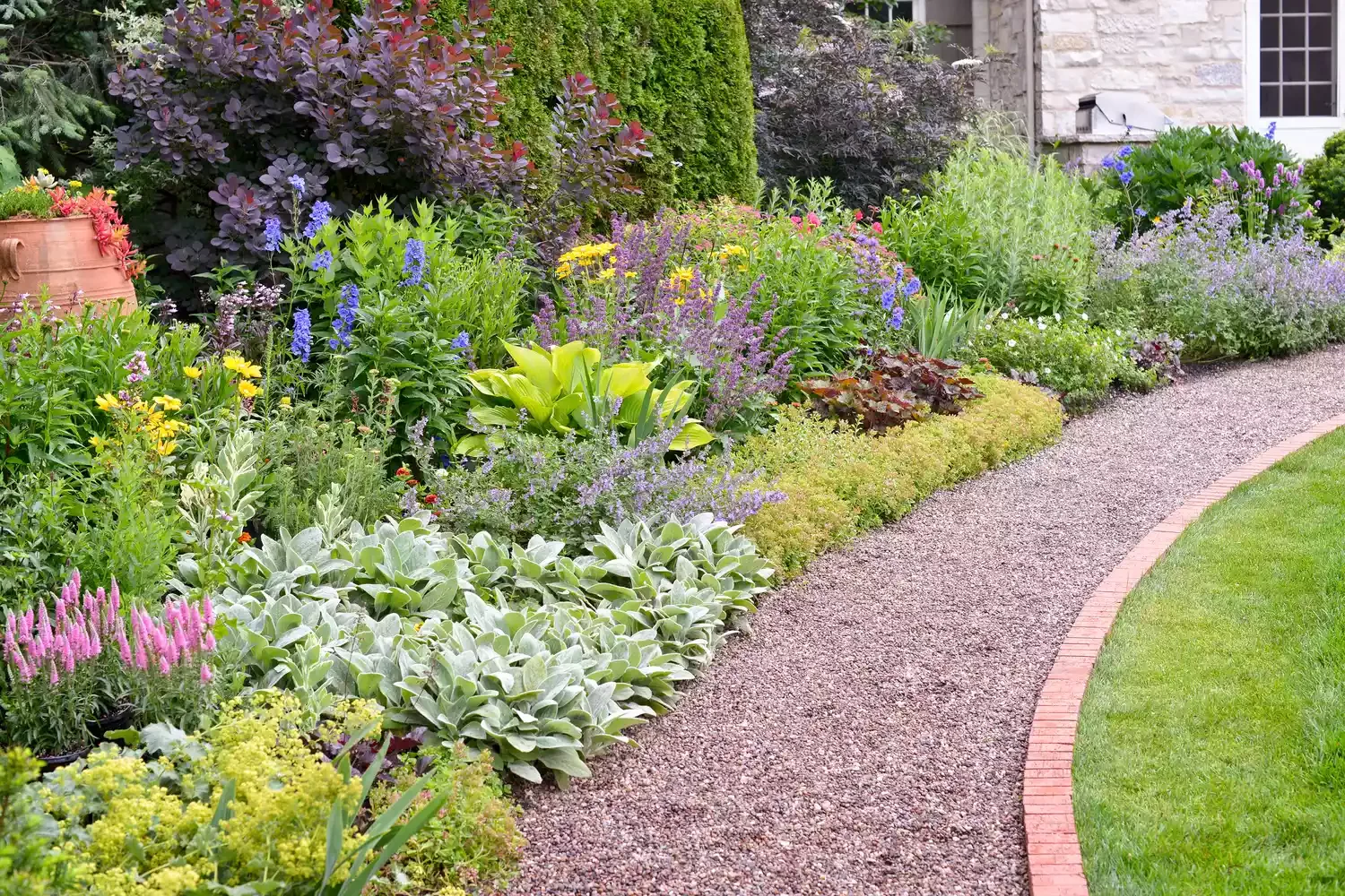 15 Beautiful Brick Border Ideas to Frame Your Garden Beds on Any Budget Brick and Gravel Edging Combo