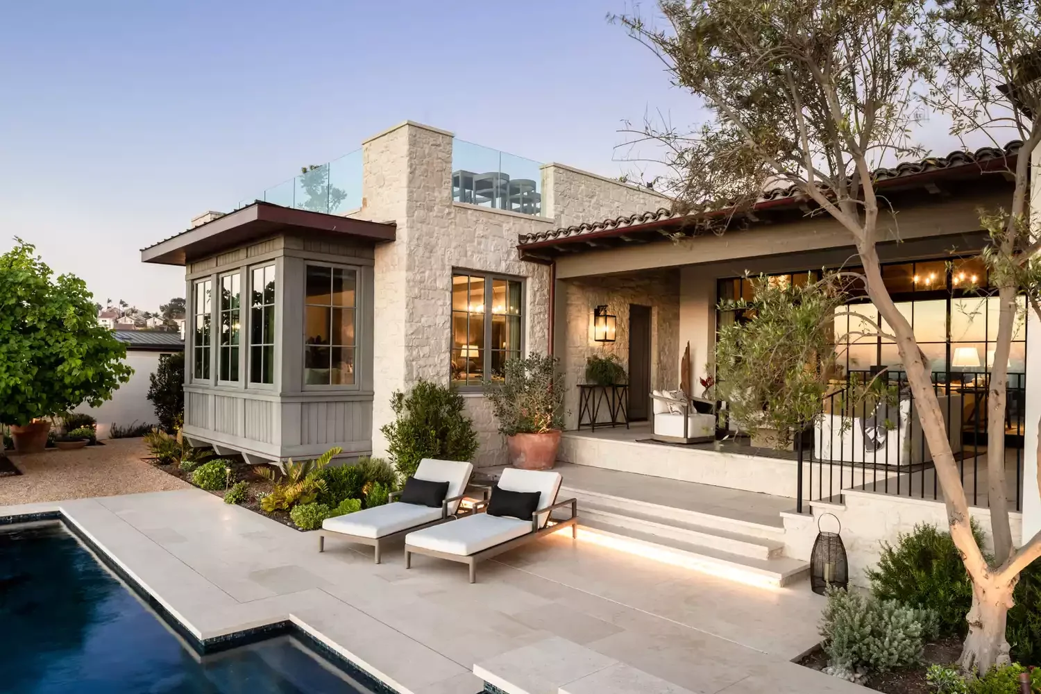 20 Stunning Grass-Free Backyard Designs That Create Lush Outdoor Retreats 6 Brighten Your Space With Lots of Lights