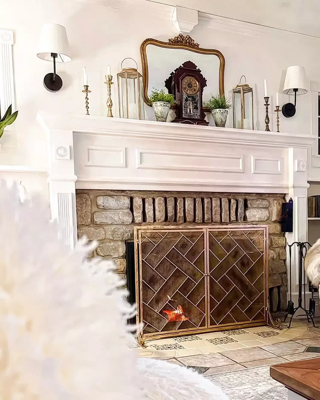33 Cozy Farmhouse Fireplace Styling Ideas That Transform Your Living Space 24 Brighten Your Space With Sconces