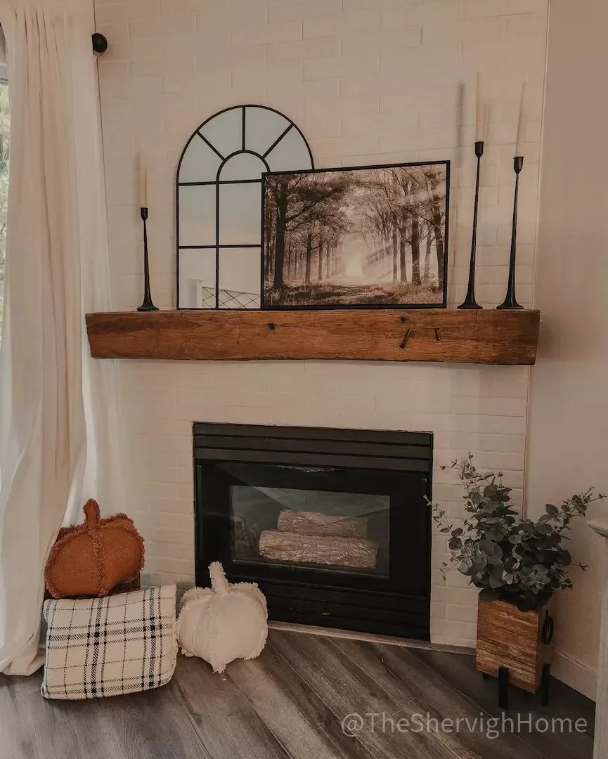 33 Cozy Farmhouse Fireplace Styling Ideas That Transform Your Living Space 2 Bring Out the Candle Sticks