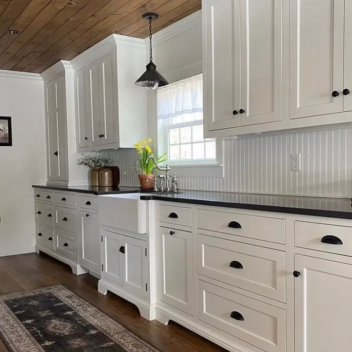 23 Stunning Wood Ceiling Ideas That'll Transform Every Room in Your Home 12 Bring Warmth Into an All-White Kitchen