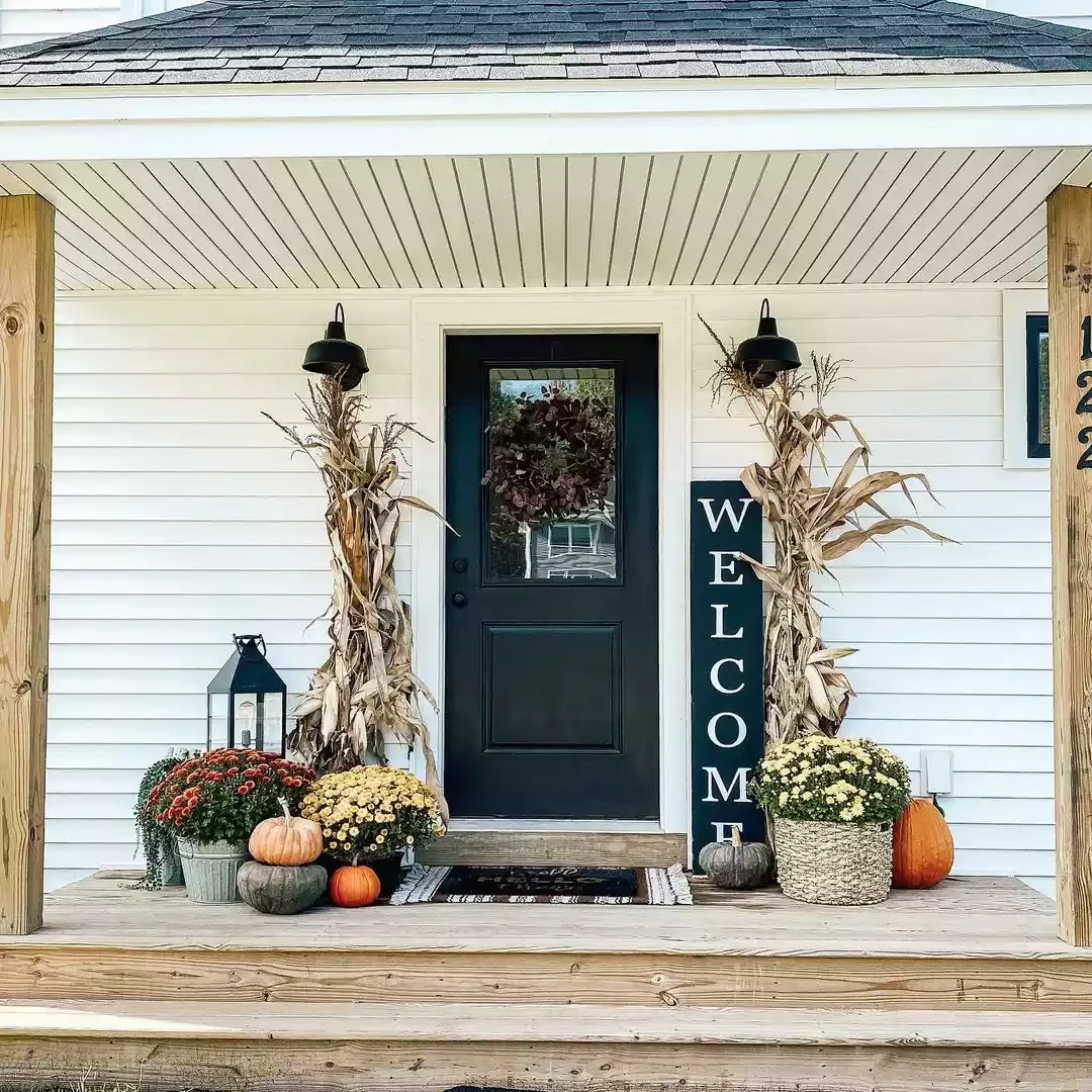 41 Beautiful Fall Outdoor Decorating Ideas to Transform Your Space This Season 32 Bring in Dried Cornstalks for a Harvest Feel