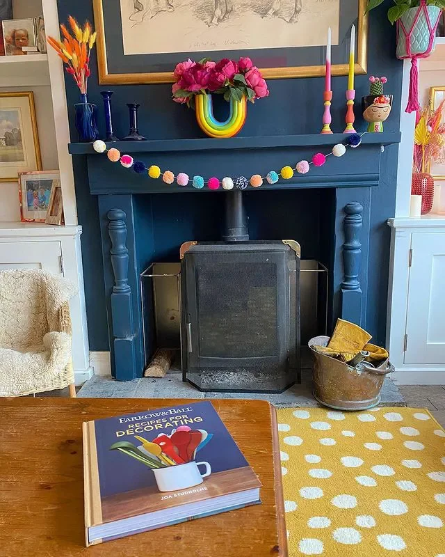 36 Stunning Painted Fireplace Ideas to Transform Your Living Space 4 Bring in Moody Dark Blue