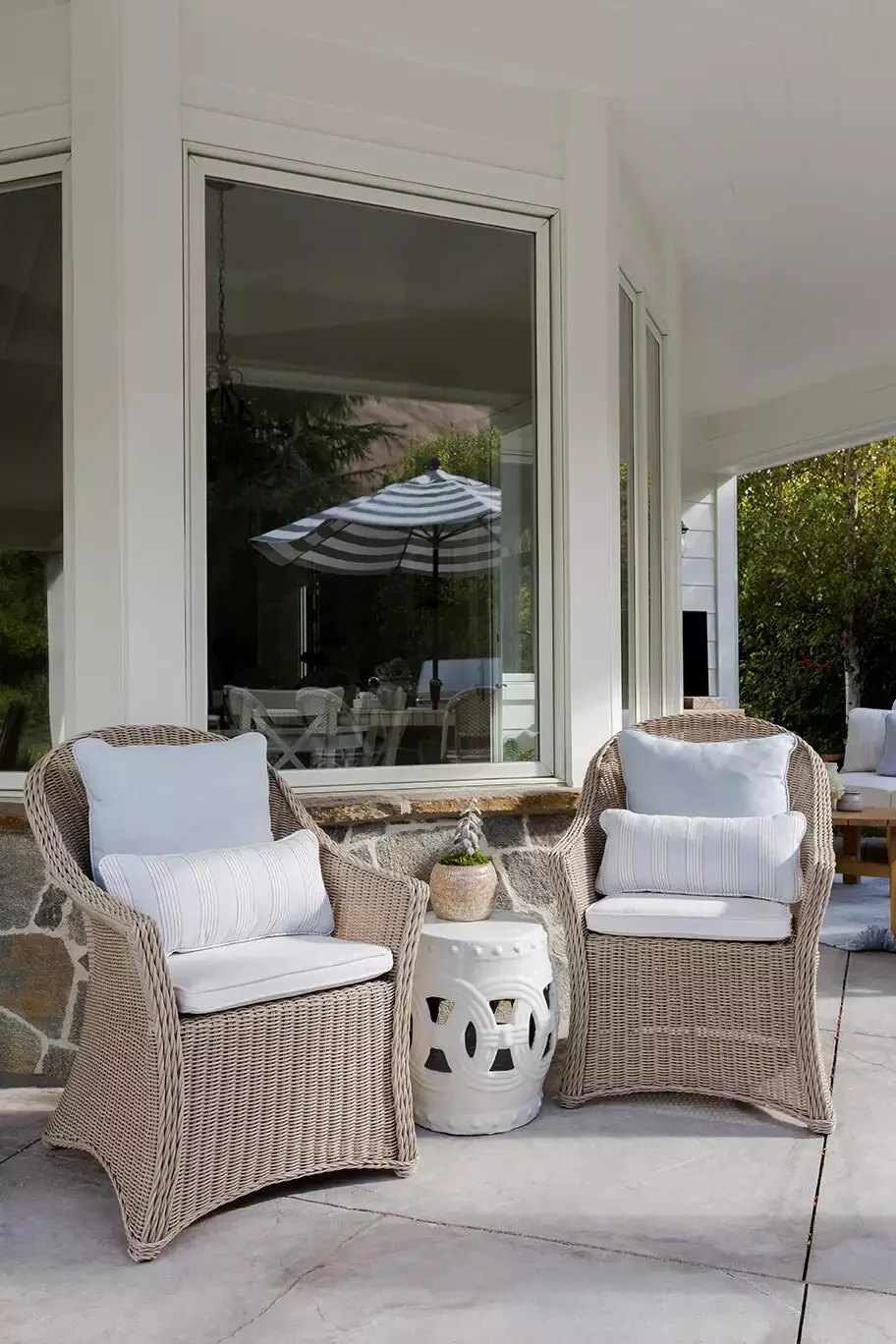 38 Charming Farmhouse Porch Ideas That Create the Perfect Welcome 25 Bring in Rattan Accents