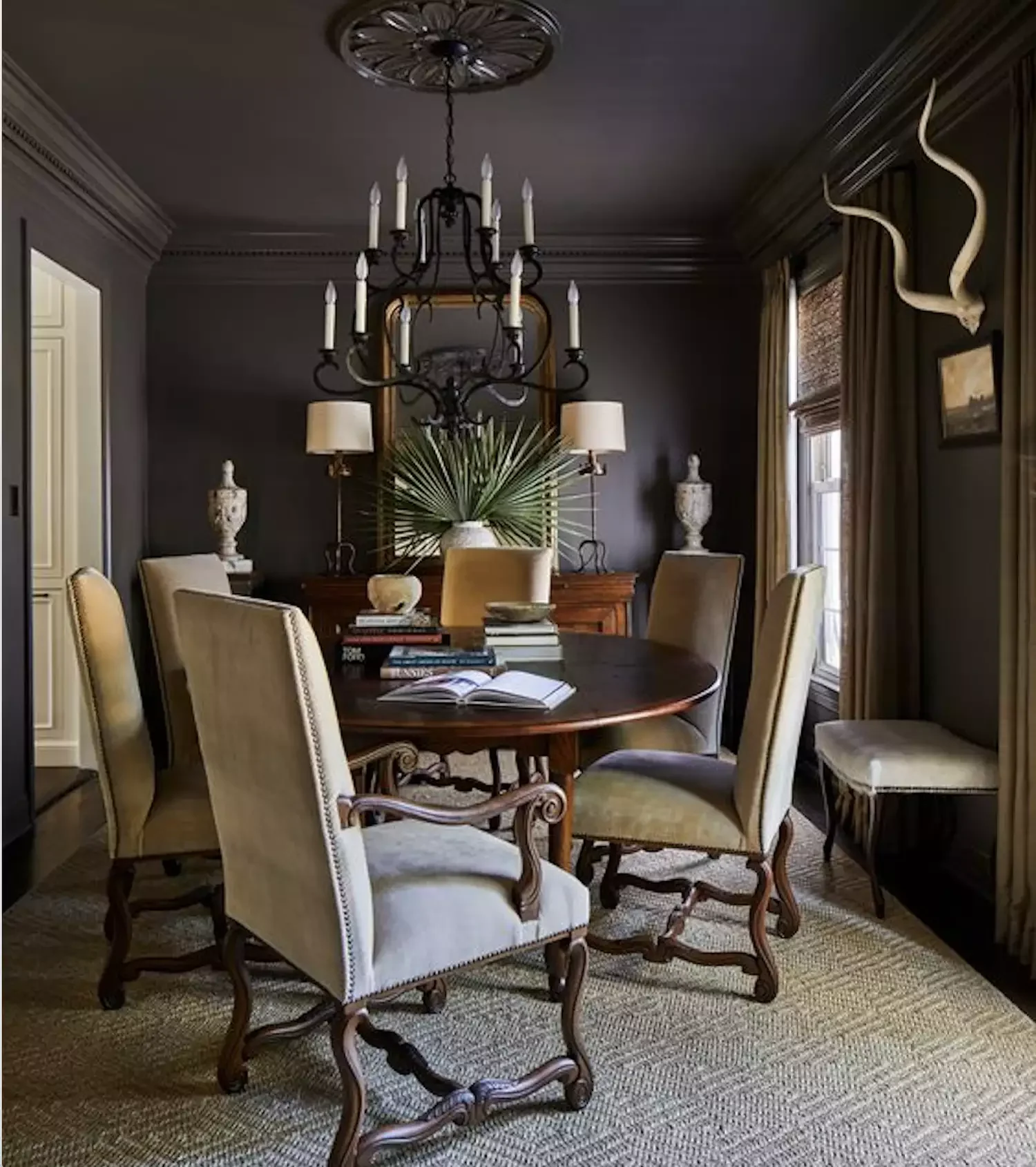 40 Stunning Black Dining Room Ideas to Transform Your Space 3 Bring in Warmth With Brown