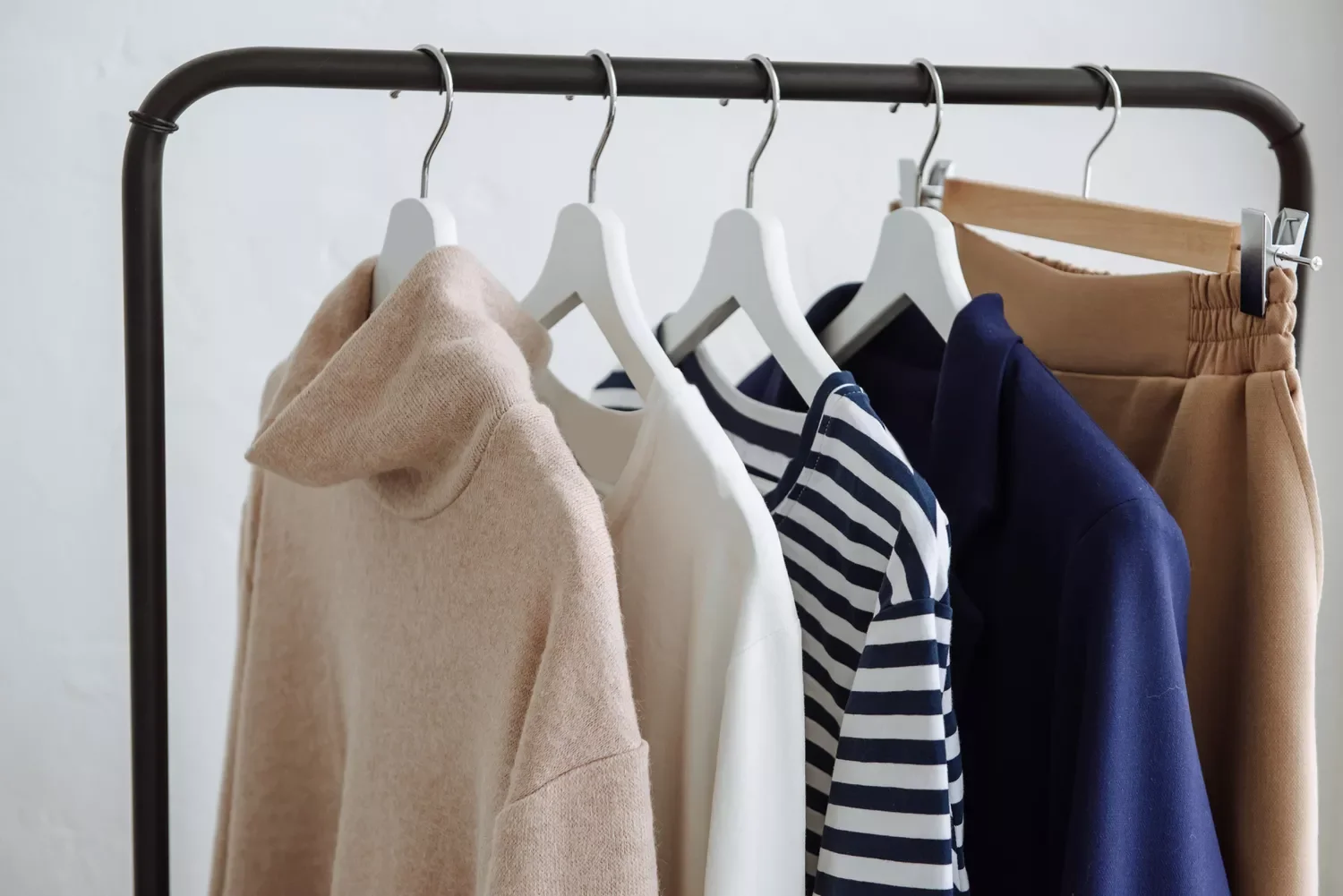 27 Brilliant Small Closet Organization Ideas That Actually Work Bring in a Rolling Rack