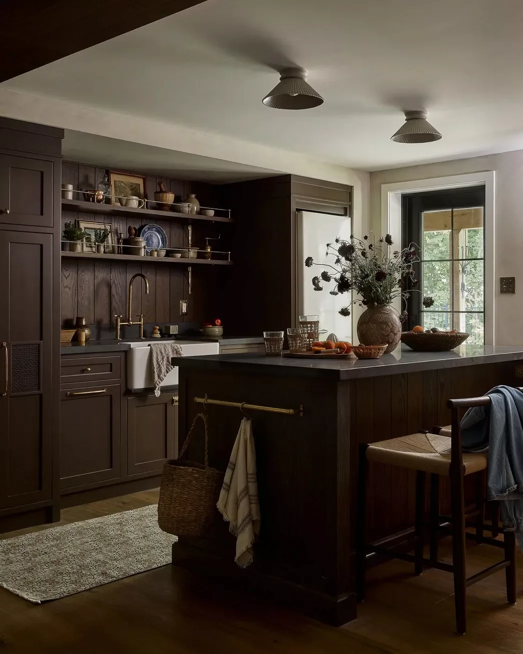 21 Moody Kitchen Designs That Will Transform Your Space Brown Stained Wood Paneling