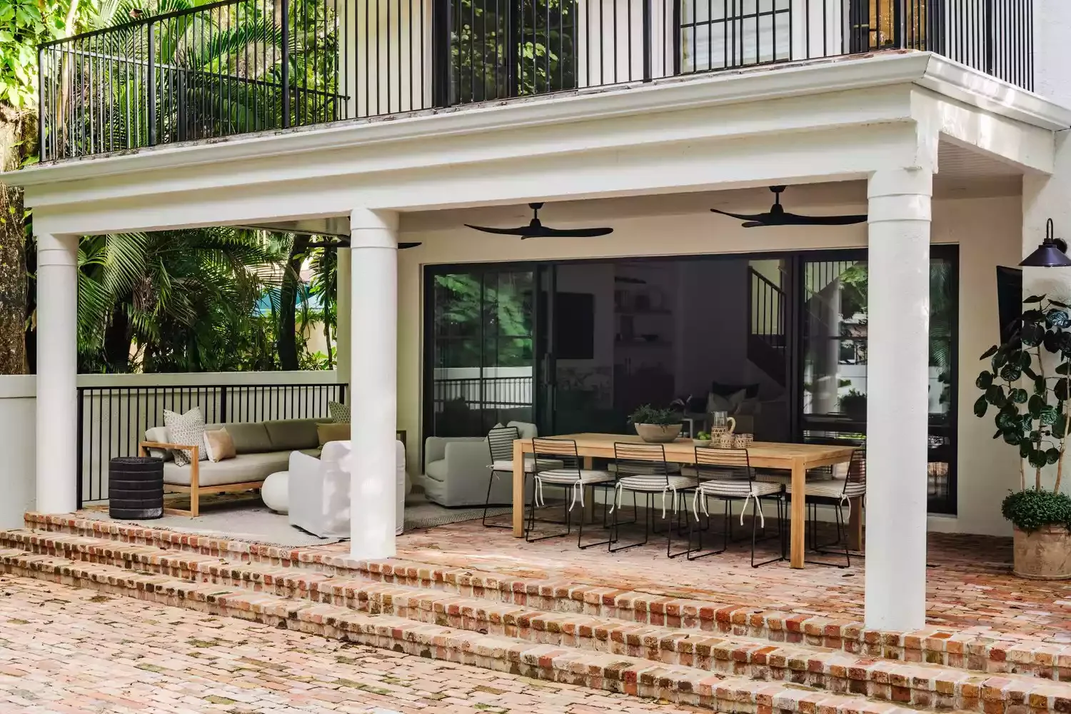 15 Creative Sloped Backyard Transformations That Maximize Your Outdoor Space Build Brick Patio Steps