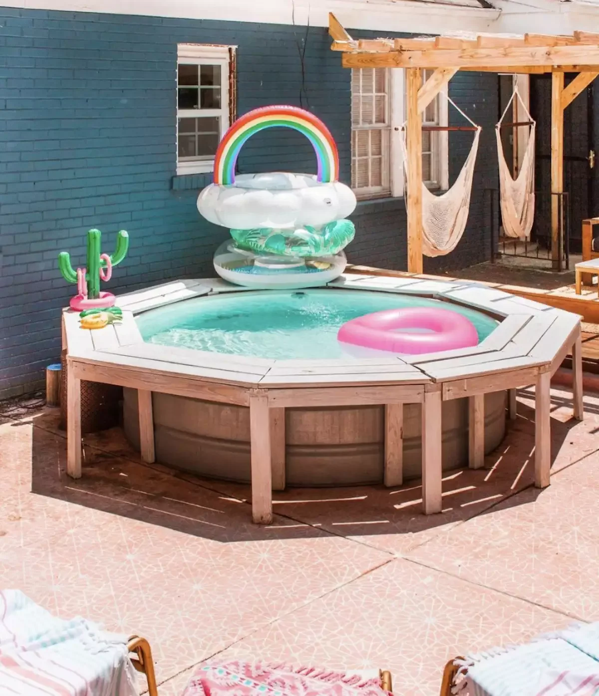 33 Creative Stock Tank Pool Ideas to Transform Your Backyard 6 Build a Custom Bench
