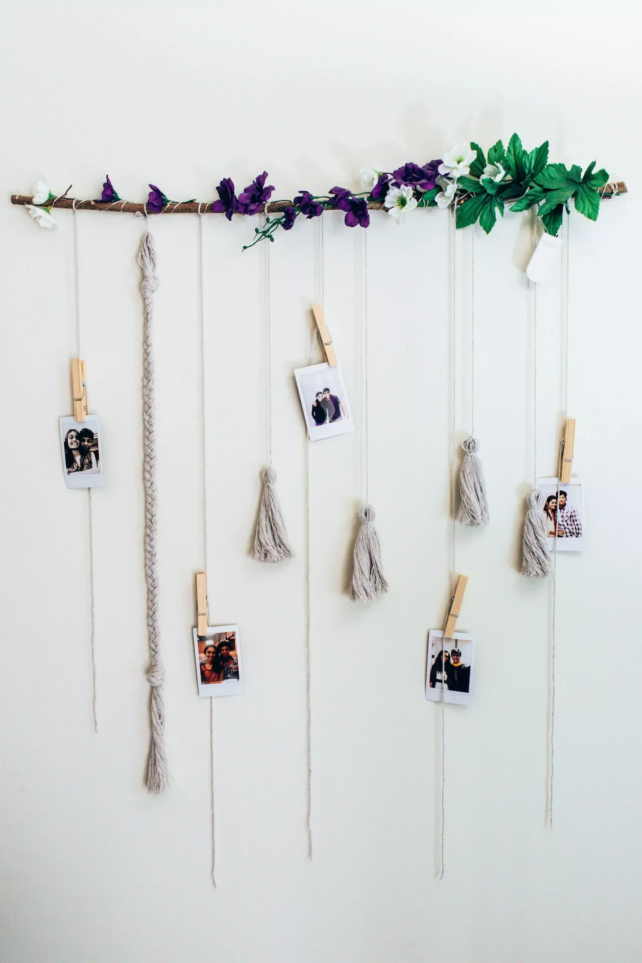 26 Creative Family Photo Wall Ideas That Will Transform Your Home 3 Build a Hanging Polaroid Display