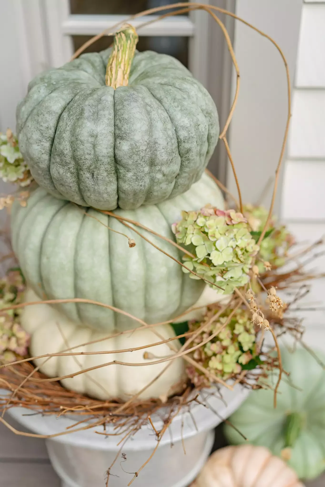 23 Stunning Natural Fall Decorations to Transform Your Home This Autumn 1 Build a Pumpkin Stack Planter