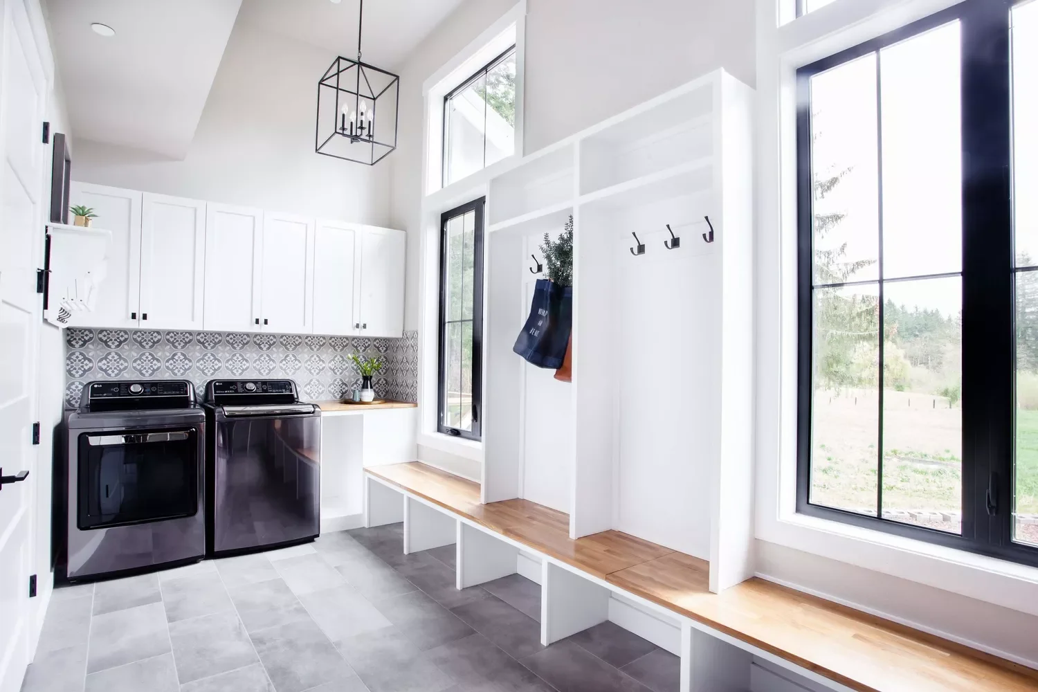 57 Creative Laundry Room Ideas That'll Make You Actually Enjoy Doing Chores Build in a Window Seat